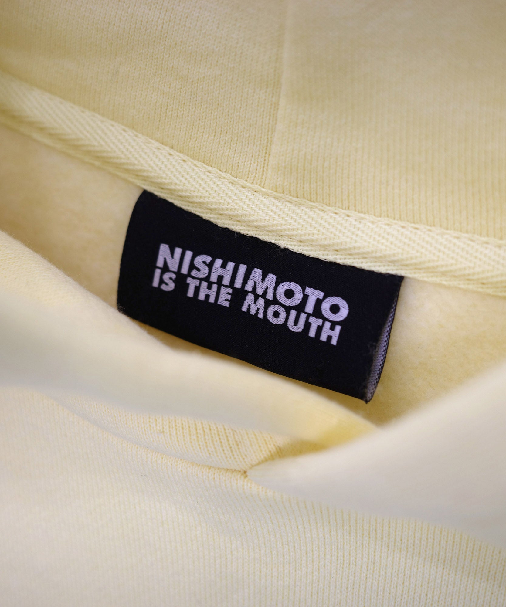 NISHIMOTO IS THE MOUTH WIDE SWEAT PONCHO NIM-WD09 LIGHT YELLOW